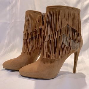 Gianni Bini heeled boots.